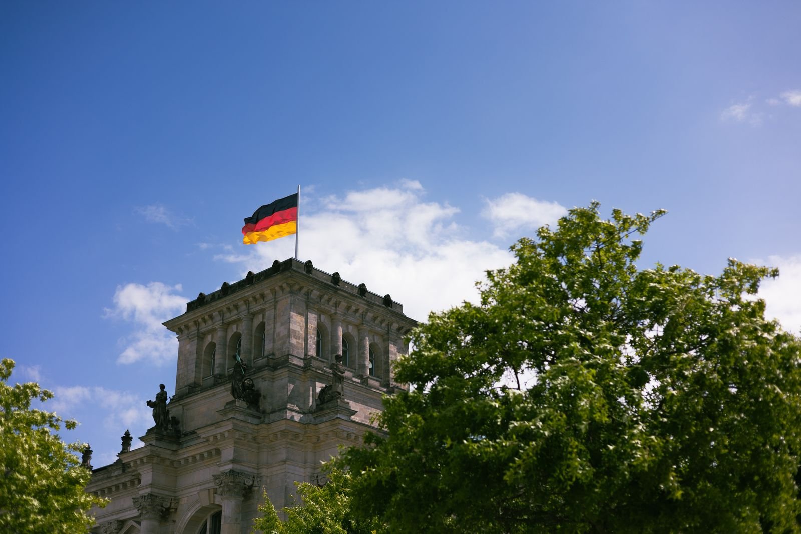 The Reichstag in Berlin with the German flag
